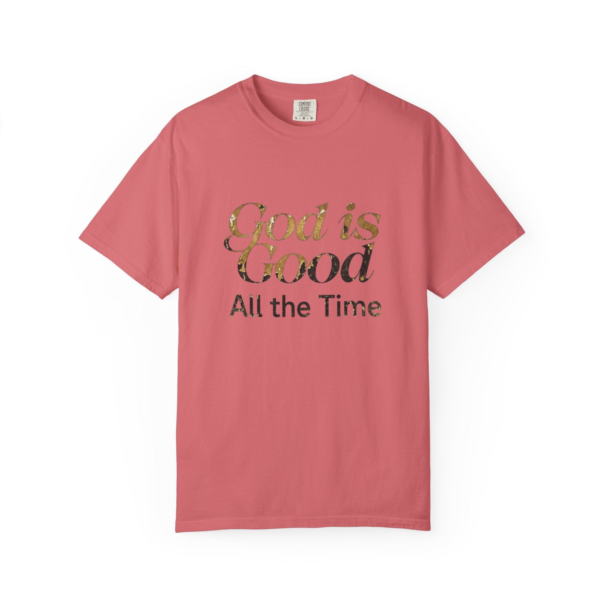 Pink t-shirt with 'God is Good All the Time' text on a white background