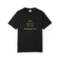 Black t-shirt with gold graphic and text 'The King Has Come' on a white background
