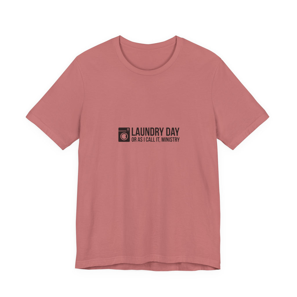 Pink t-shirt with black text on a white background