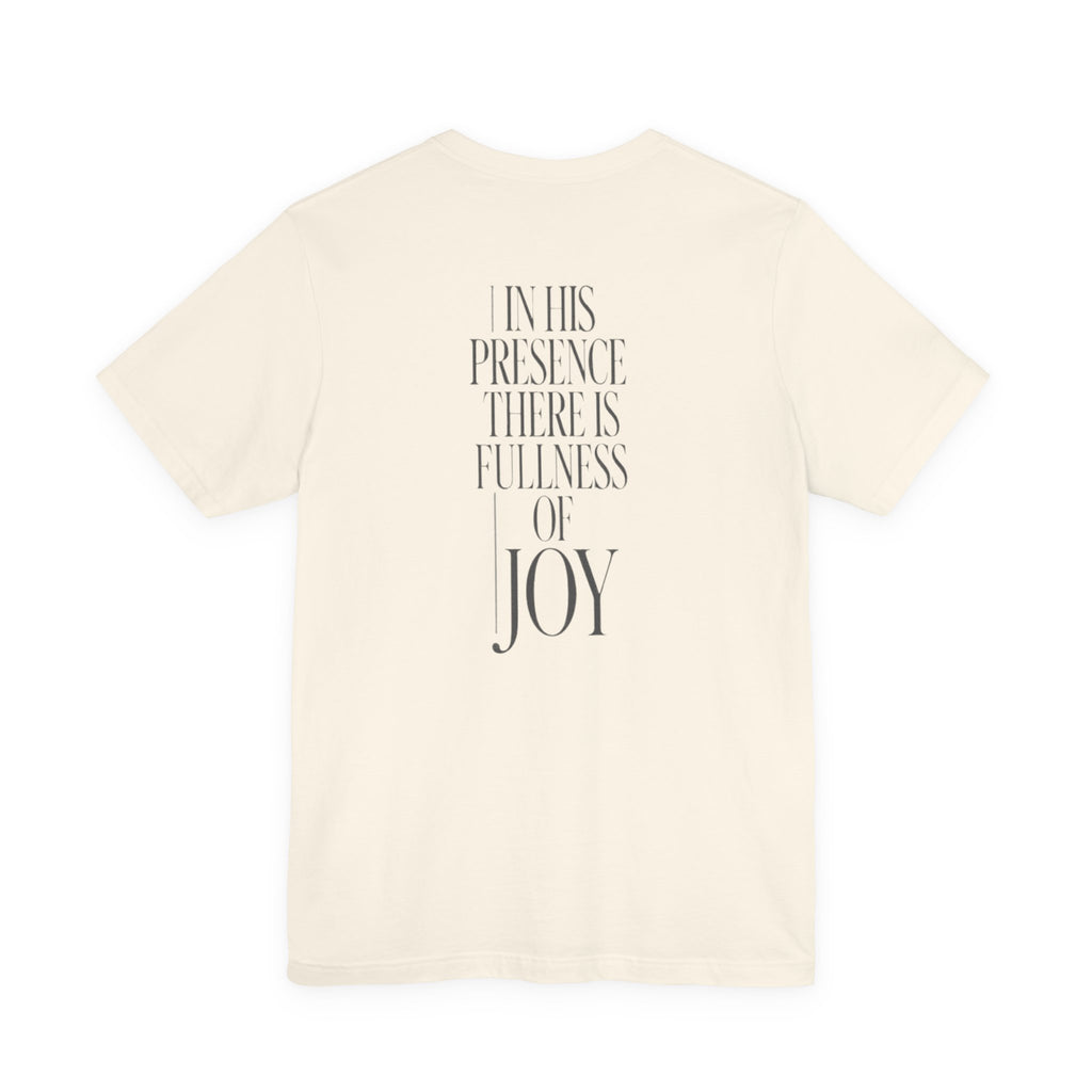 Beige t-shirt with text 'In His Presence There is Fullness of Joy' on a white background