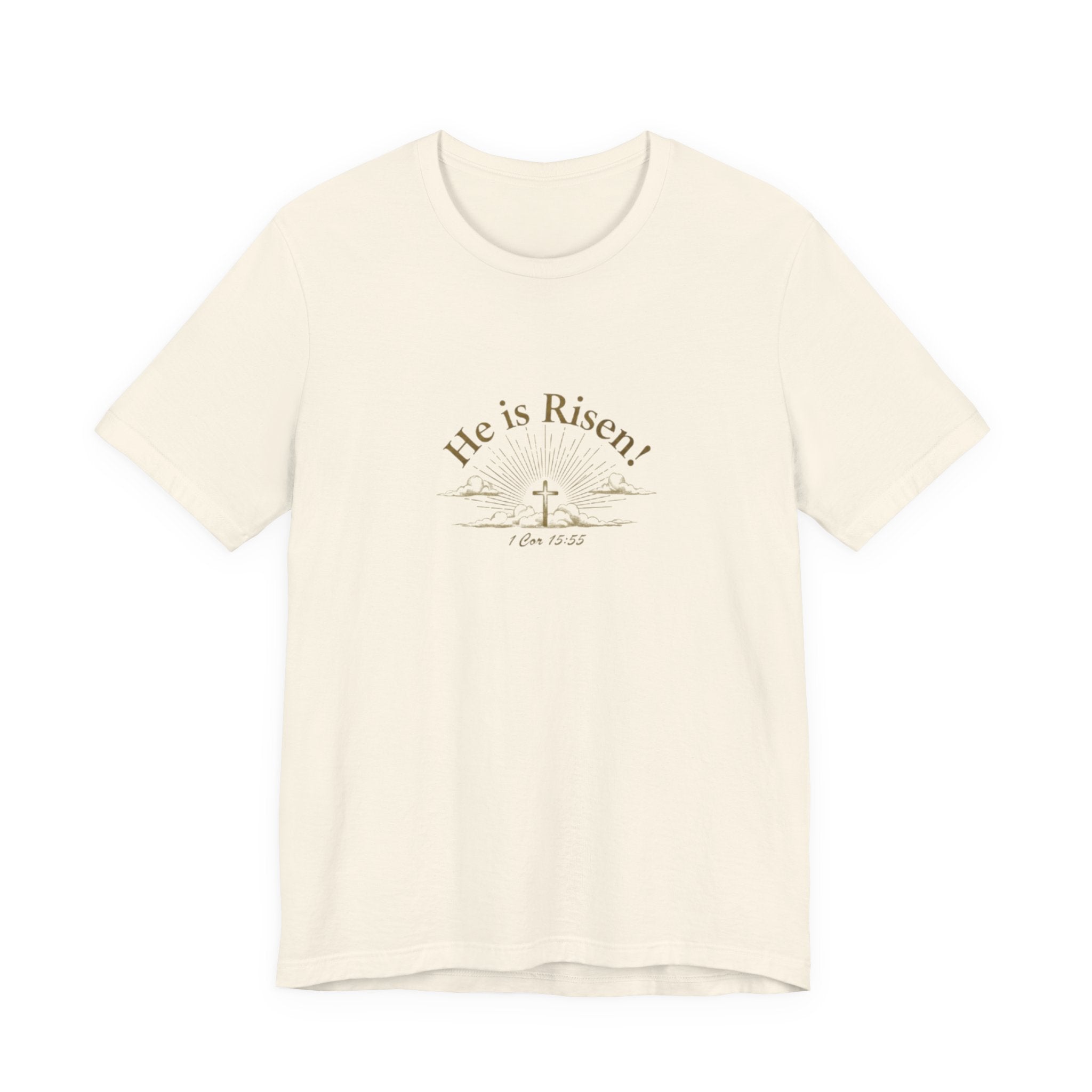 Beige t-shirt with 'He is Risen!' text and cross design on a white background