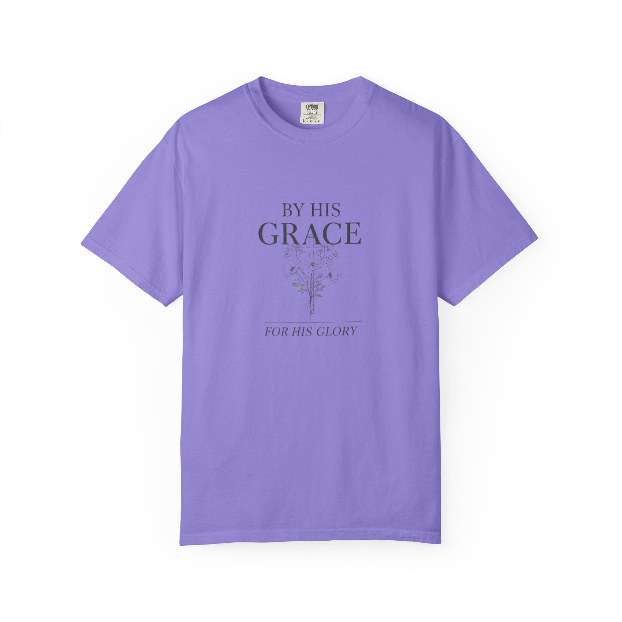 Purple t-shirt with text 'By His Grace, For His Glory' on a white background
