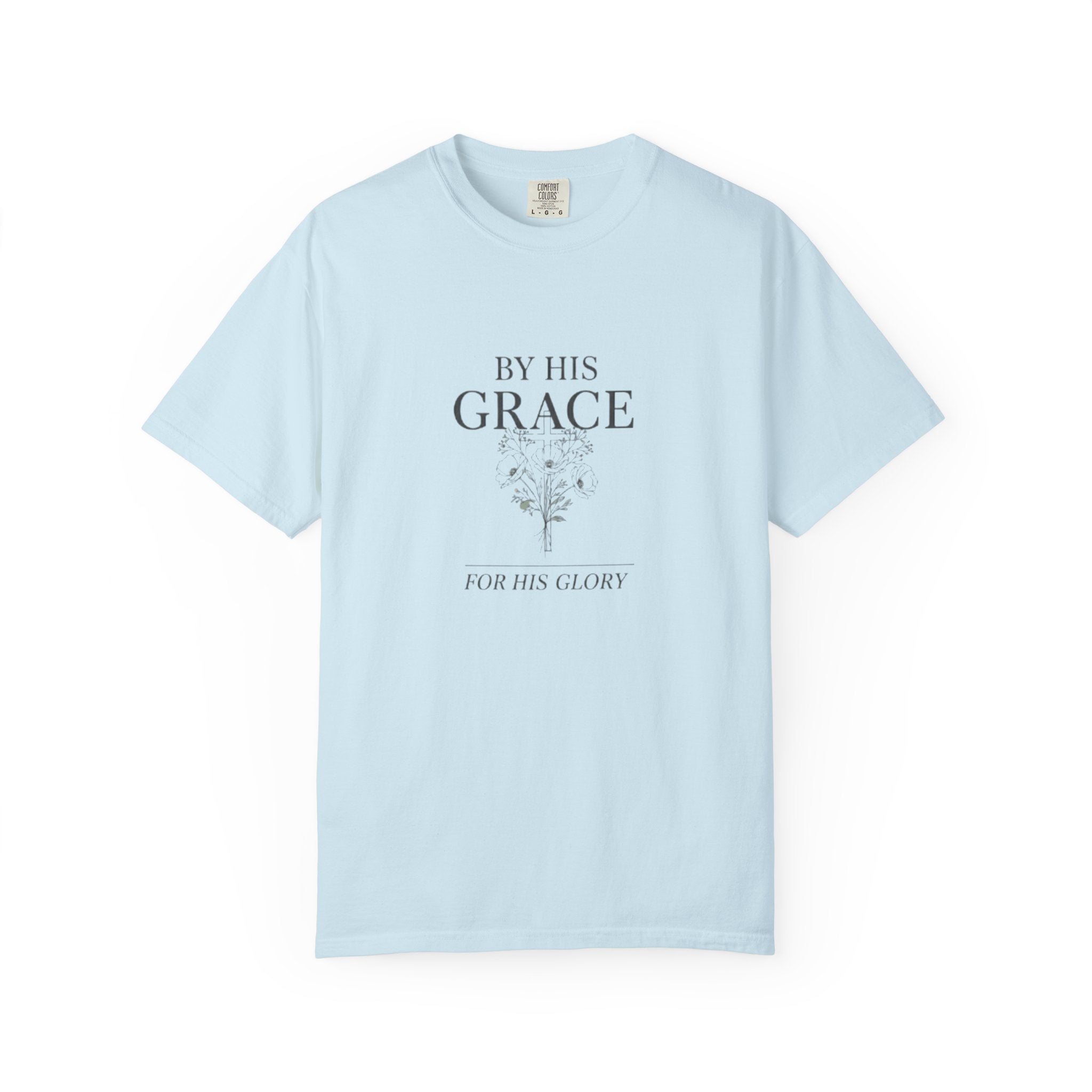 Light blue t-shirt with text 'By His Grace, For His Glory' on a white background