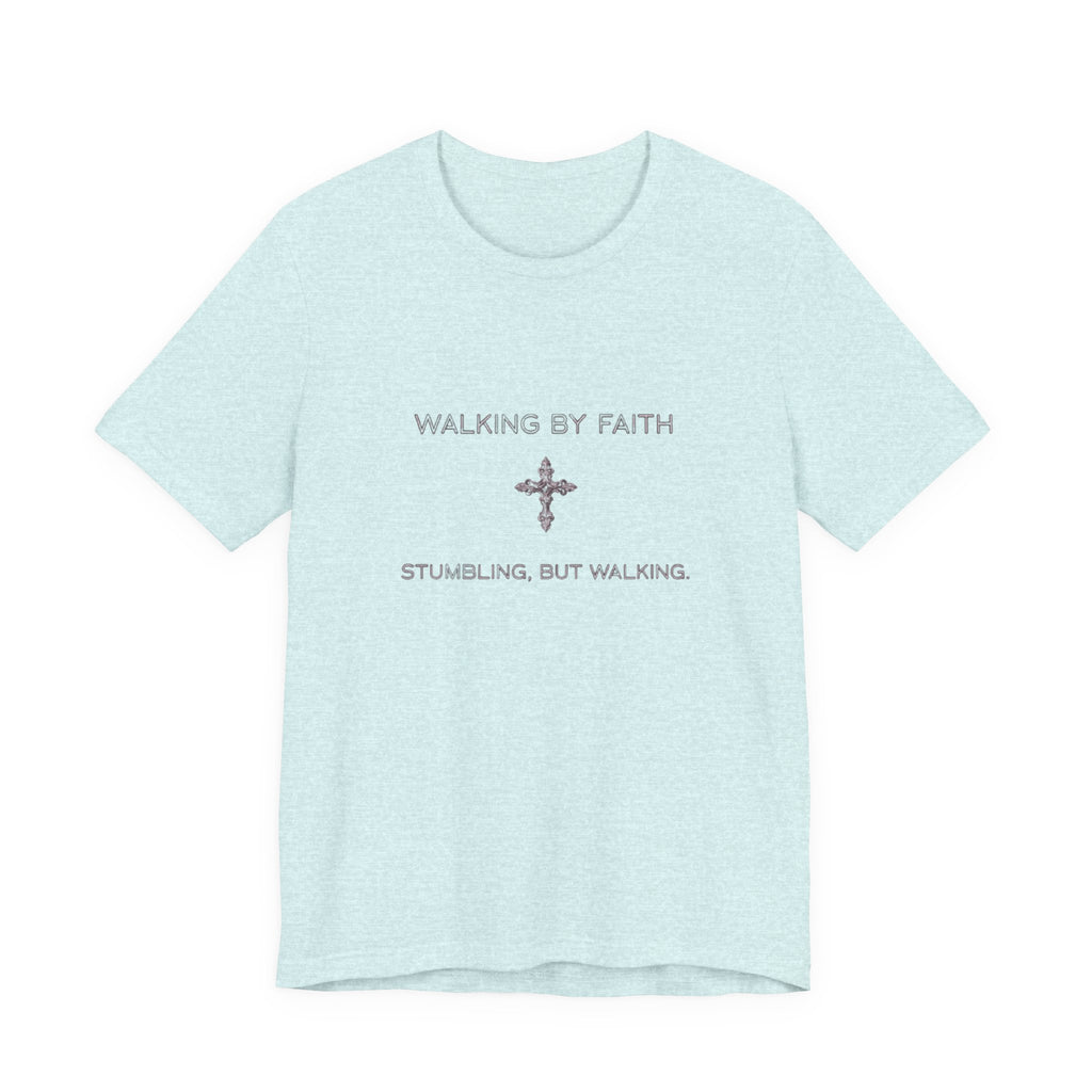 Light blue t-shirt with text 'Walking by Faith, Stumbling, but Walking' on a white background
