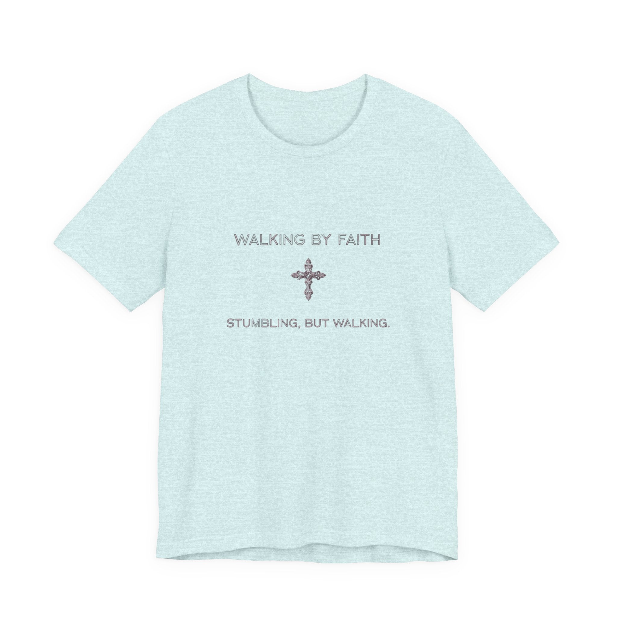 Light blue t-shirt with text 'Walking by Faith, Stumbling, but Walking' on a white background