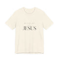 Beige t-shirt with 'No King But Jesus' text on a white background