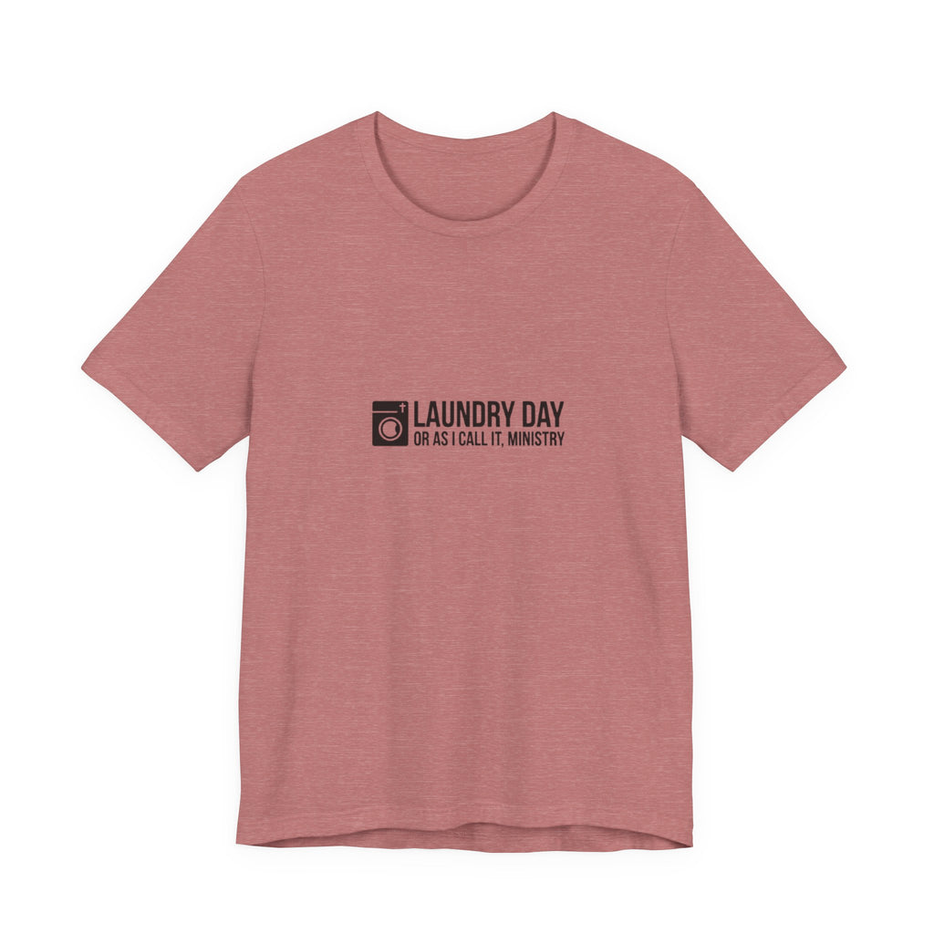 Pink t-shirt with black text on a white background