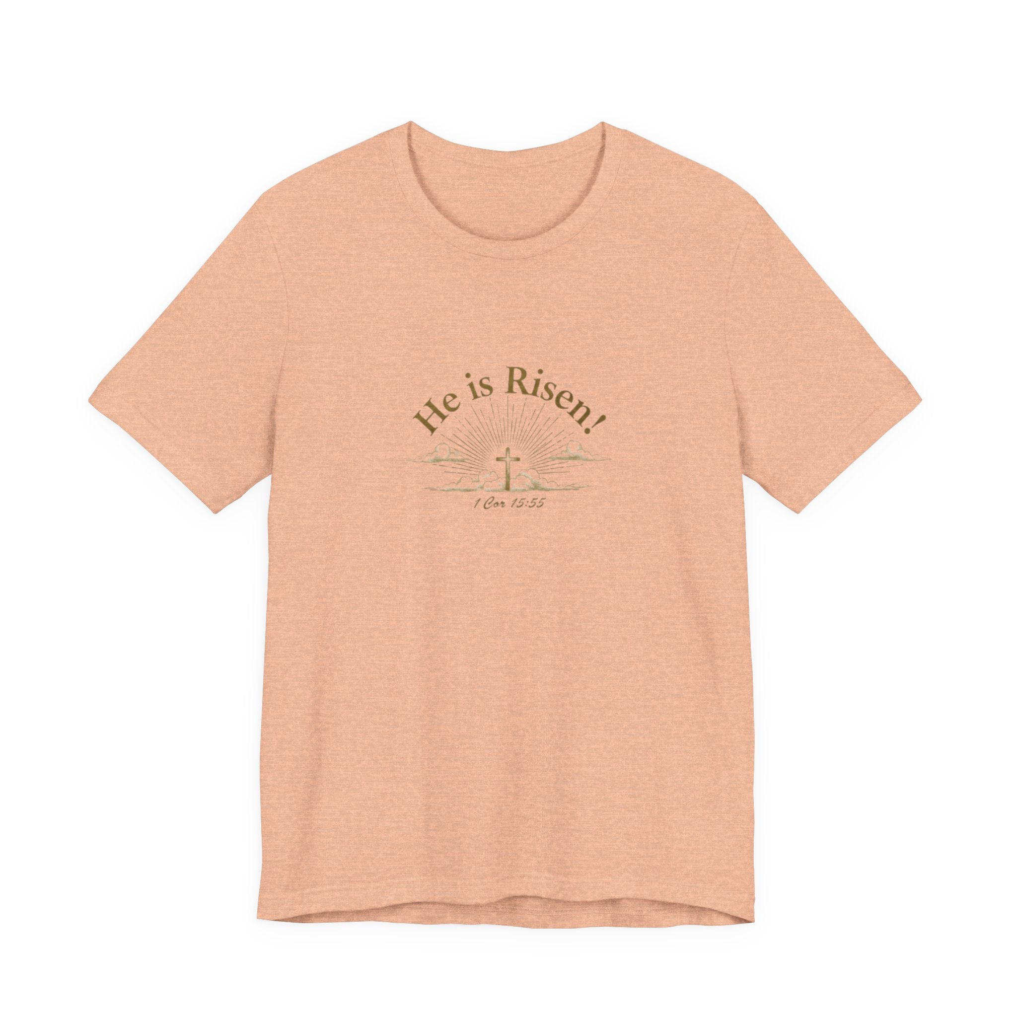 Peach t-shirt with 'He is Risen!' text and cross graphic on a white background