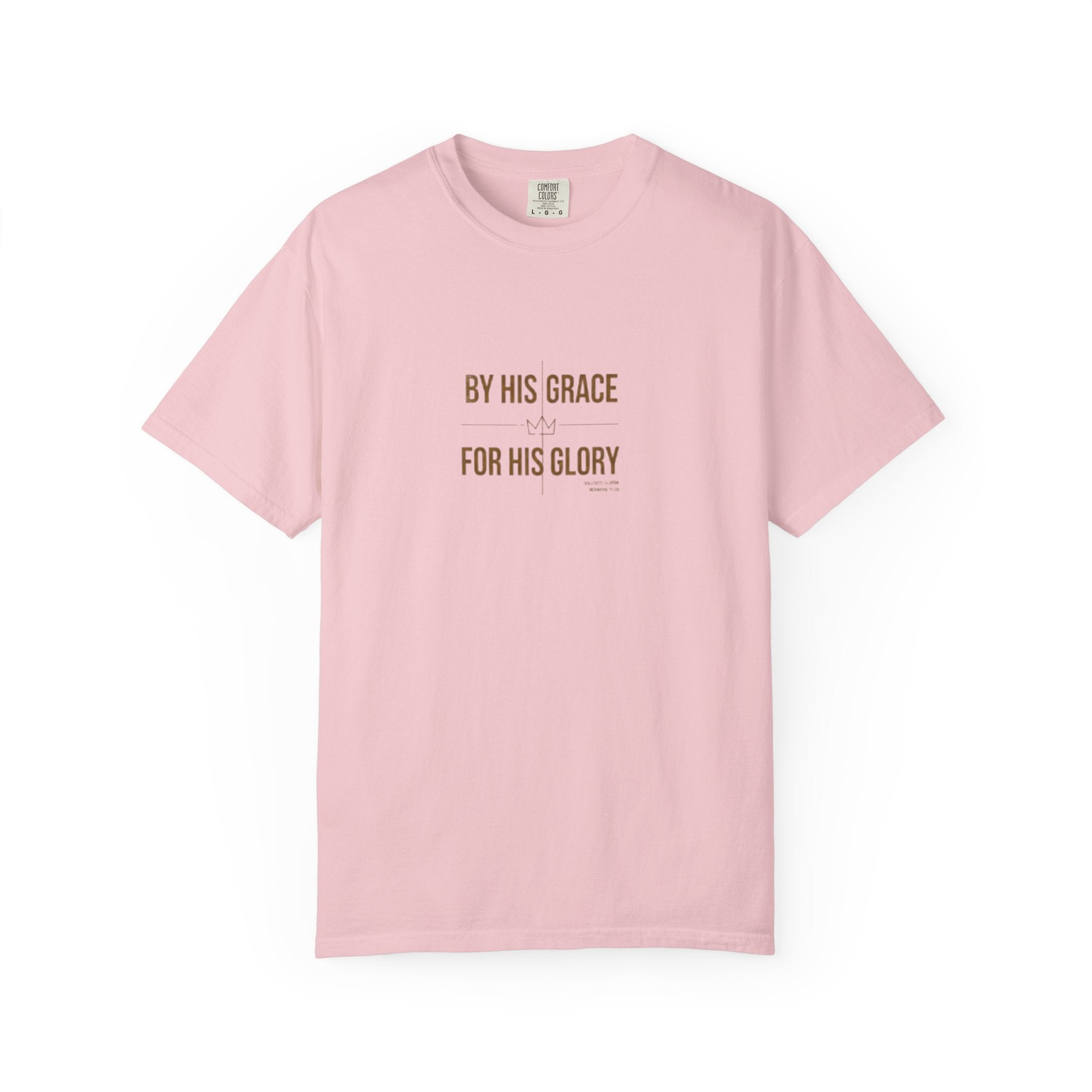 Pink t-shirt with text 'By His Grace For His Glory' on a white background