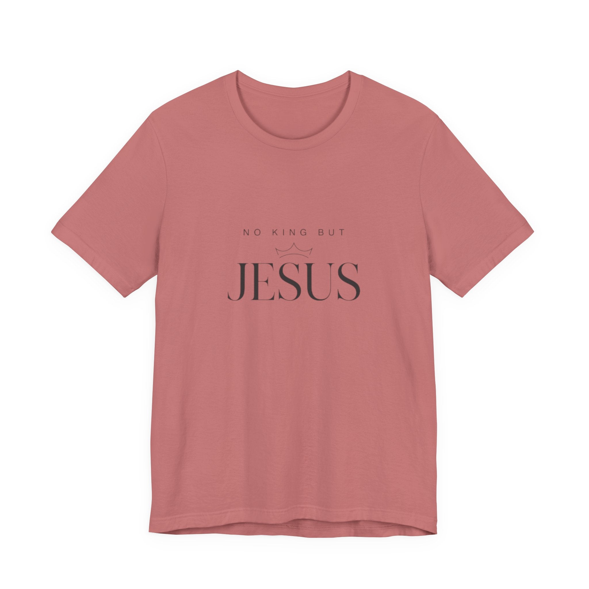 Pink t-shirt with 'No King But Jesus' text on a white background