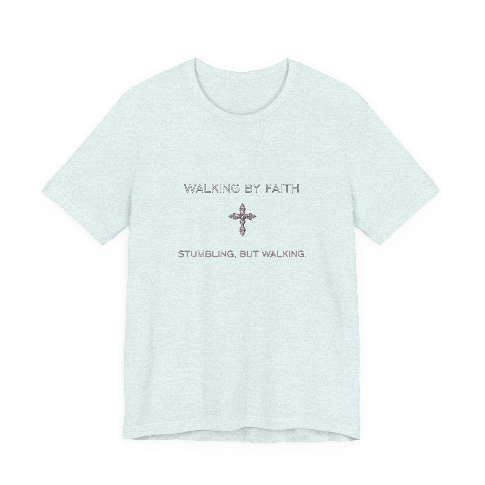 Light blue t-shirt with text 'WALKING BY FAITH STUMBLING, BUT WALKING' on a white background