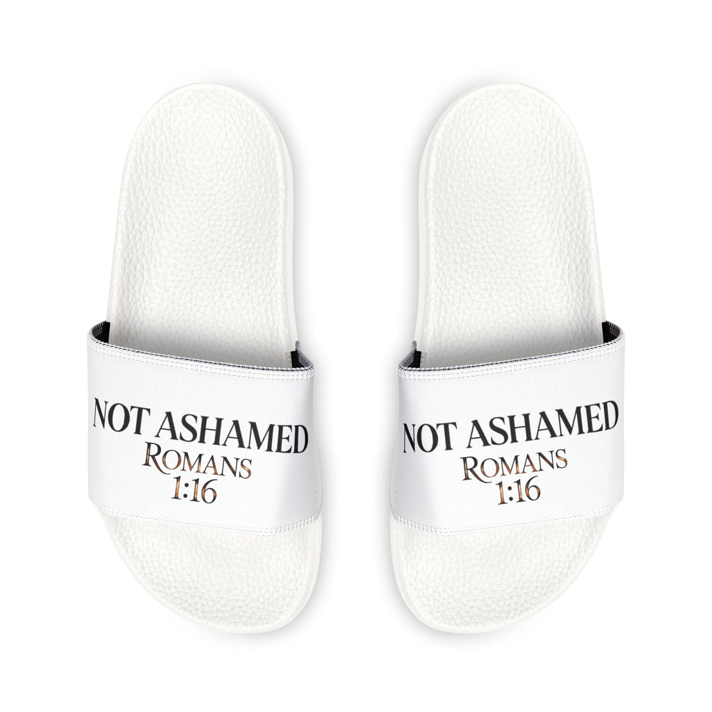 White slippers with 'Not Ashamed Romans 1:16' text on a white background