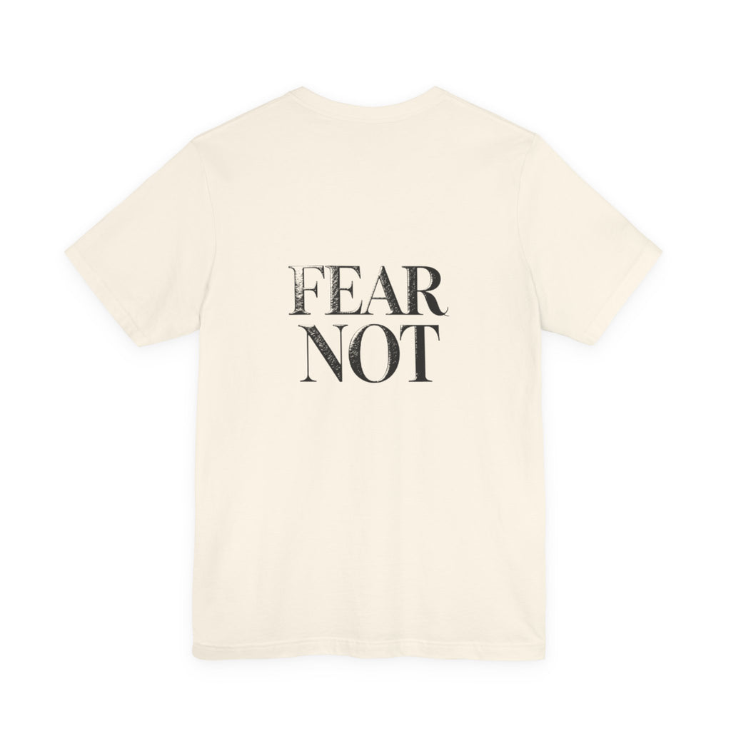 Beige t-shirt with 'FEAR NOT' text on a white background