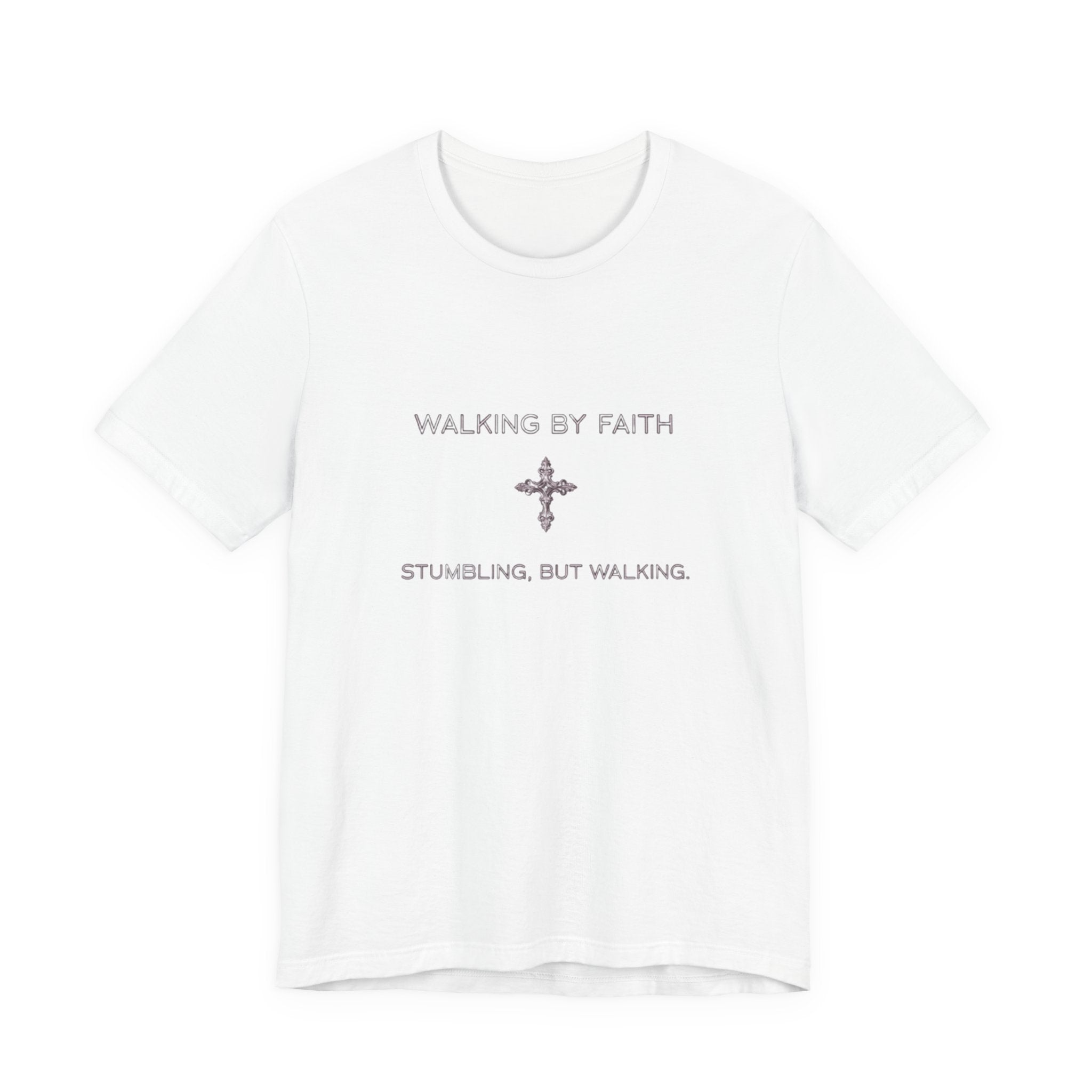 White t-shirt with 'Walking by Faith, Stumbling, But Walking' text and cross symbol on a white background