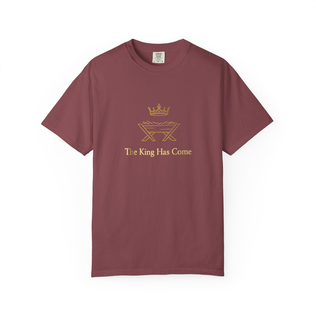 Maroon t-shirt with gold graphic and text 'The King Has Come' on a white background