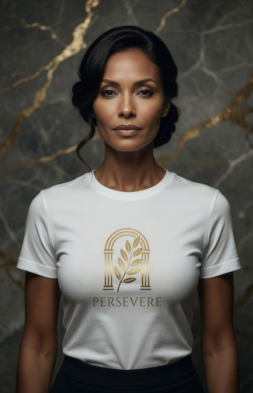 A woman wearing a white crewneck t-shirt with a gold graphic of an arch and leaf and the word 'PERSEVERE' printed below it, set against a dark marble background with gold veins.