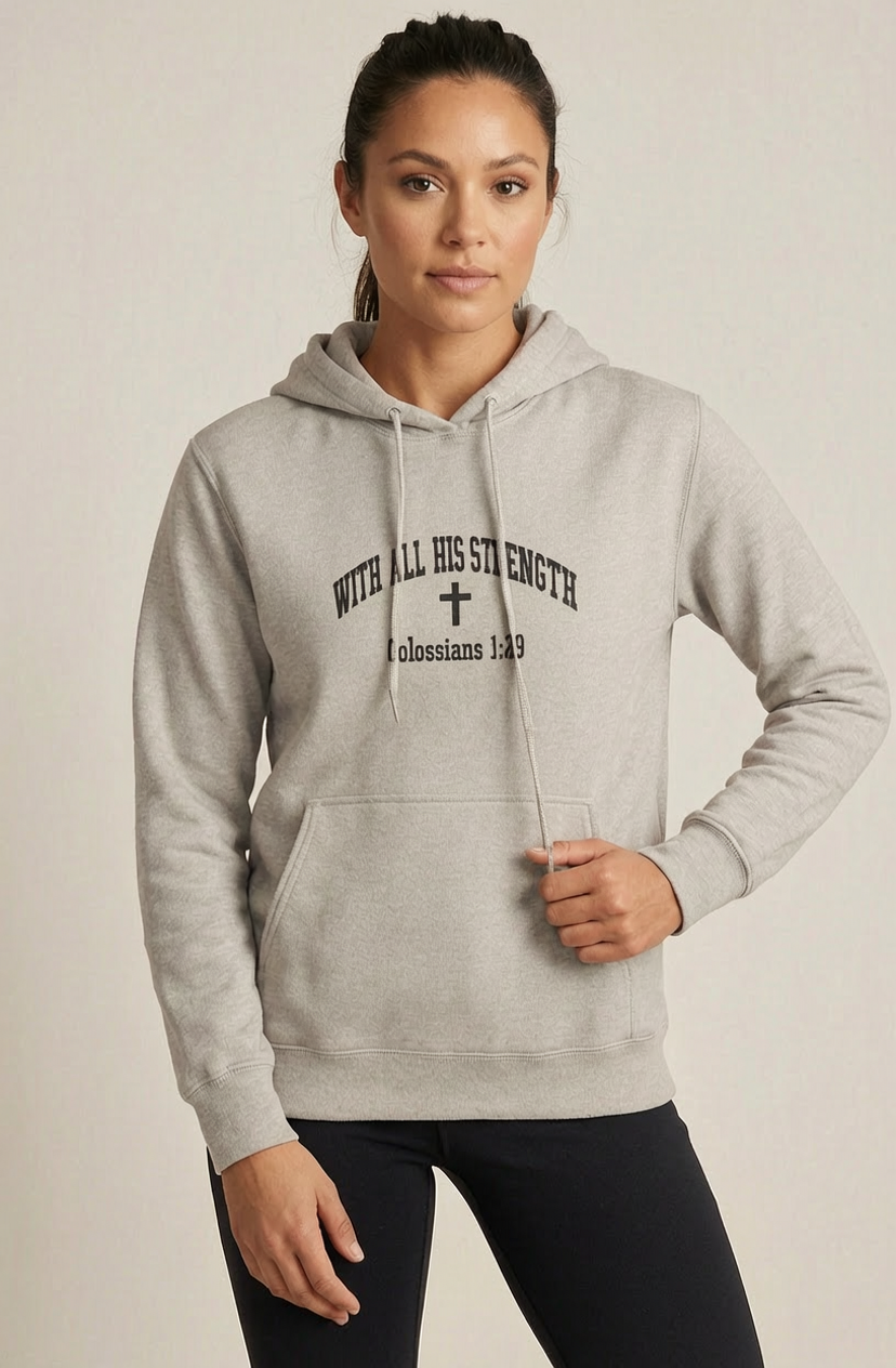 Female model wearing With All His Strength Faith Pullover Hoodie in Oatmeal Heather — editorial style, Philippians 4:13 scripture design, Christian apparel by 4HG