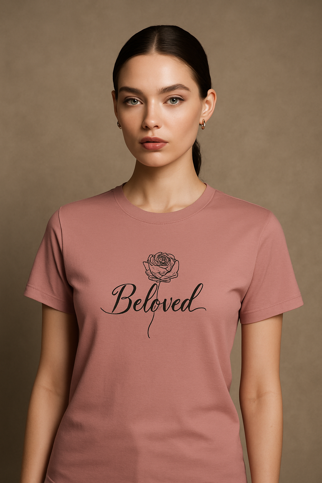 Editorial mockup with female model wearing faded rose Beloved shirt.