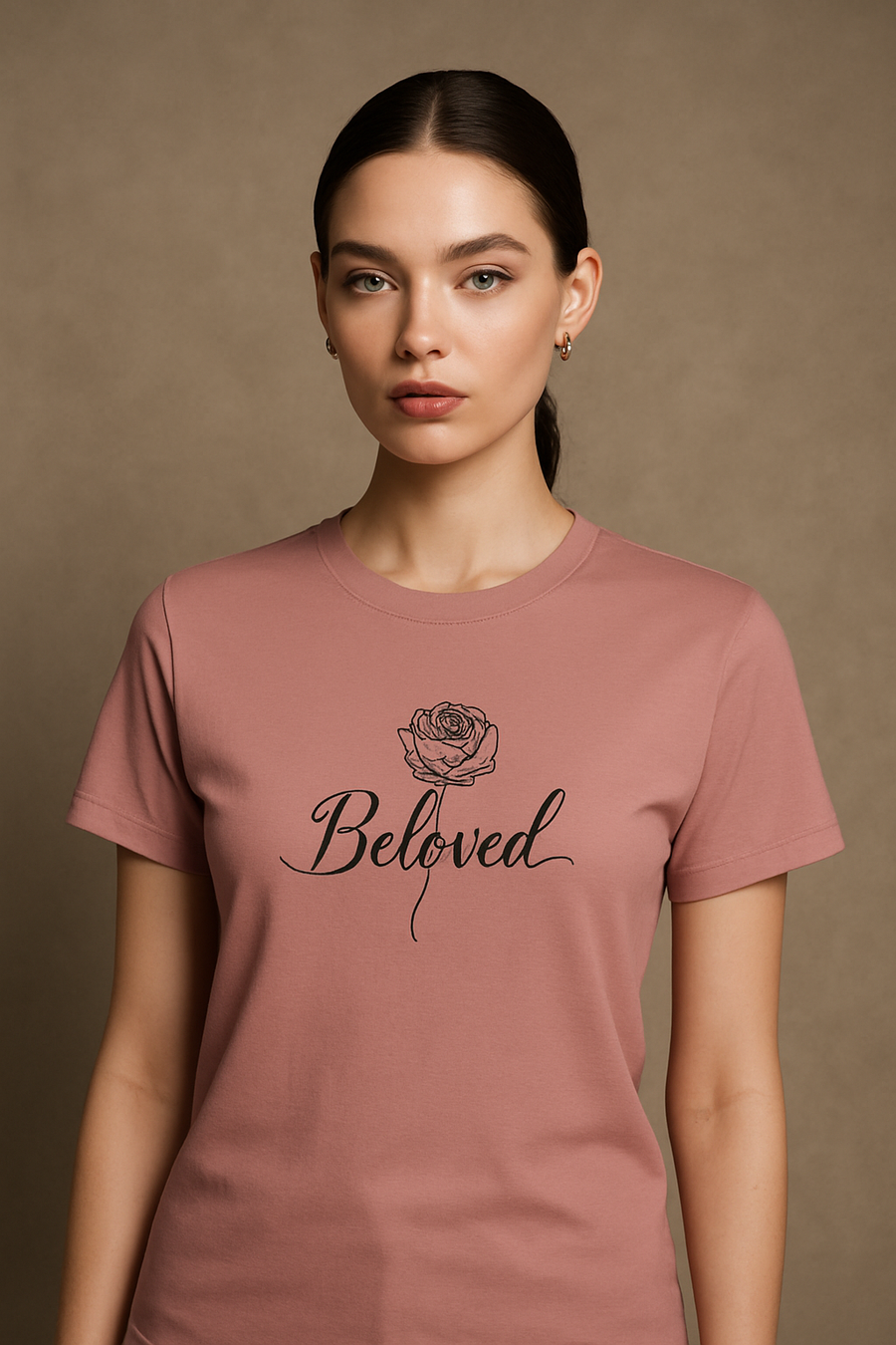 Editorial mockup with female model wearing faded rose Beloved shirt.