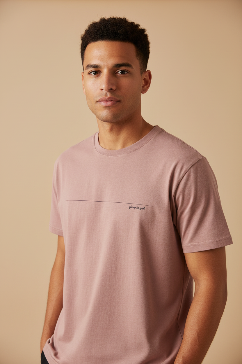 Male model wearing Glory to God Men's Staple Faded Tee in Faded Rose — editorial style front view, Psalm 115:1 Soli Deo Gloria design, garment-dyed Christian tee by 4HG