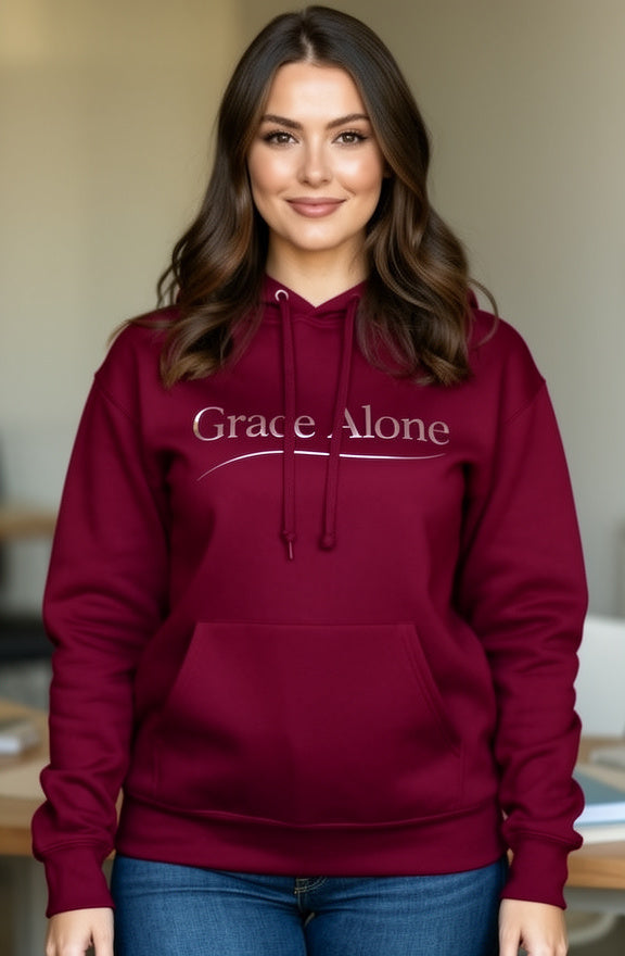 Female model wearing Grace Alone Christian Hoodie in Maroon — editorial beige background front view, Sola Gratia Grace Alone Reformed theology design, premium faith-based hoodie by 4HG