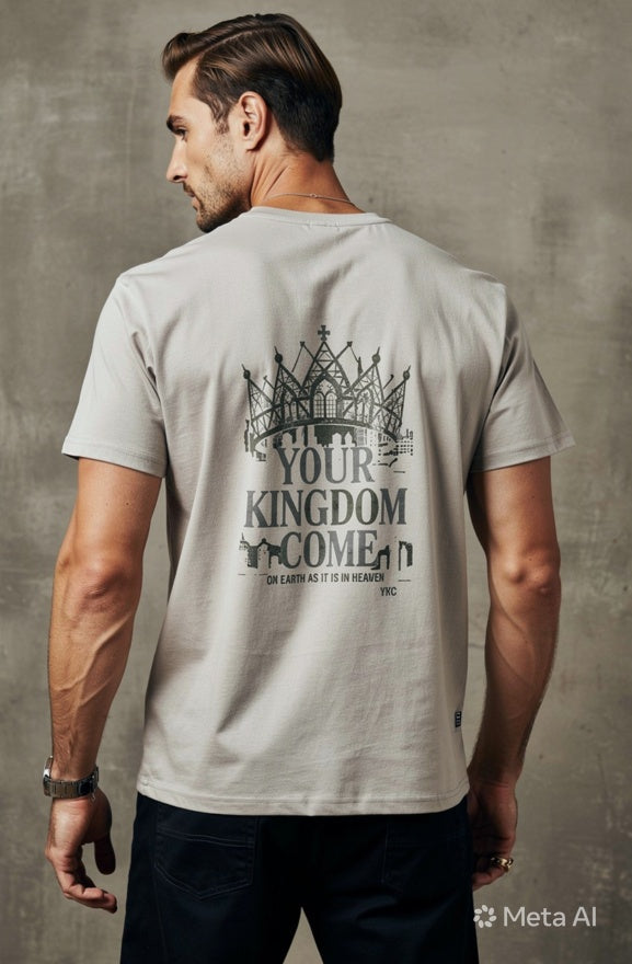 Man wearing a t-shirt with a graphic design and text on the back, standing against a plain background.