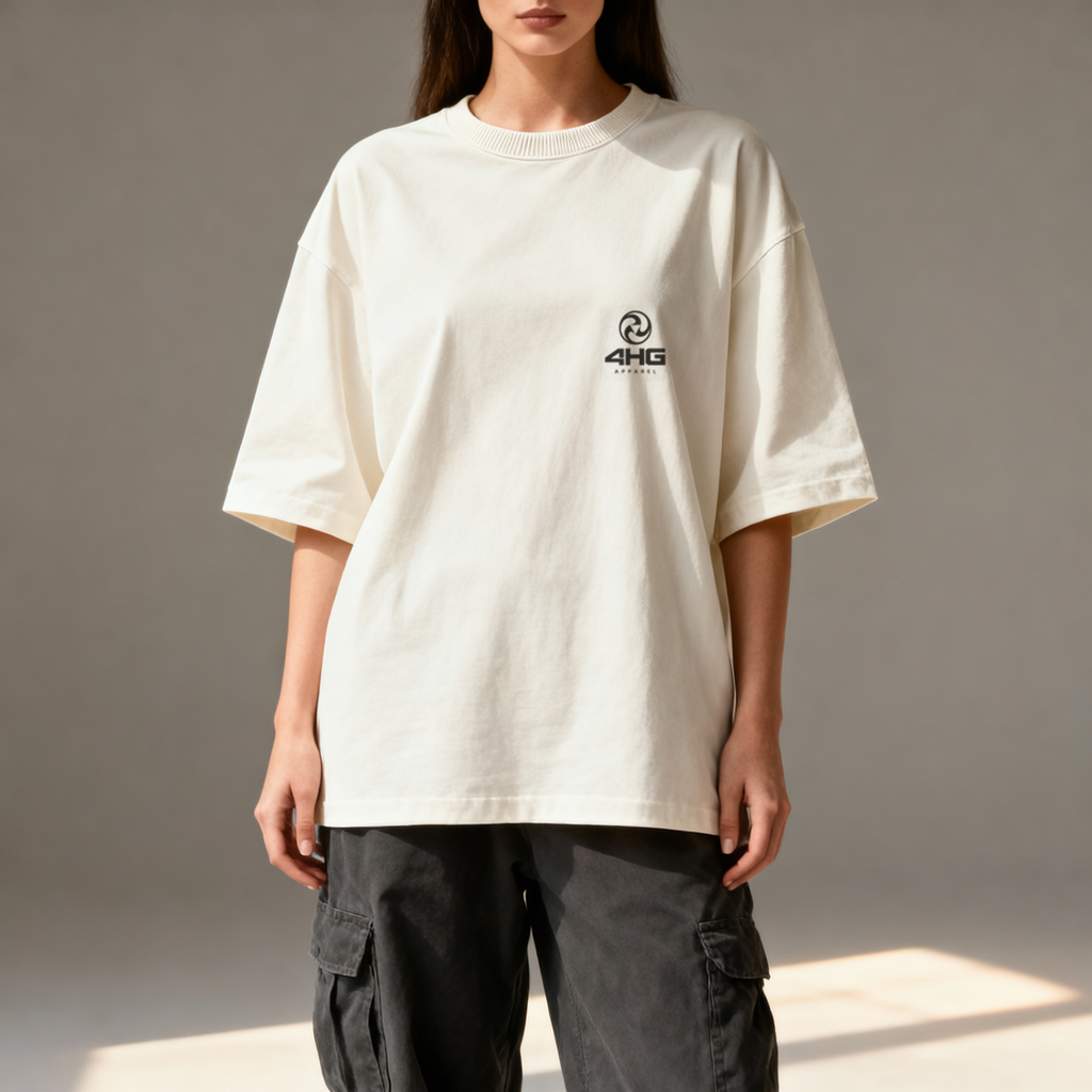 A model wearing an oversized off-white t-shirt with a small black '4HKG' logo on the left chest, paired with dark gray cargo pants, set against a neutral gray background.