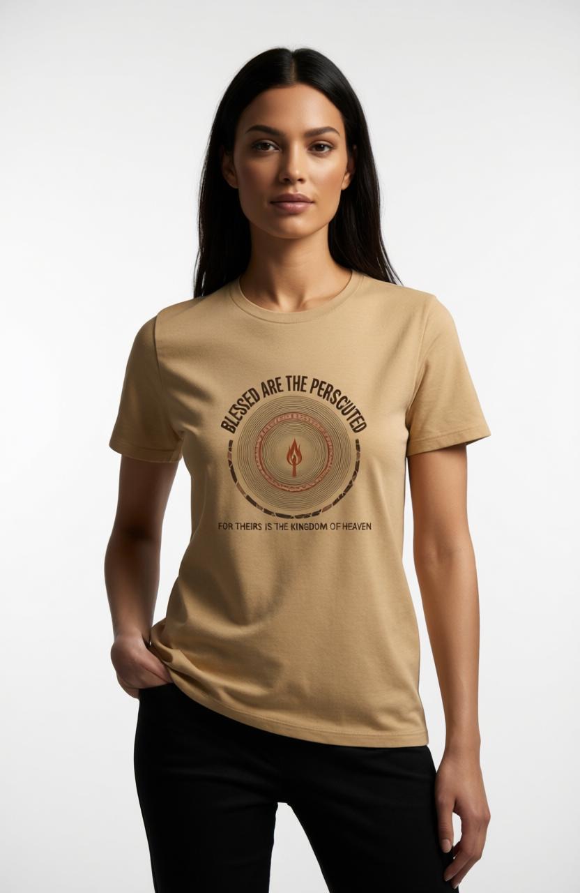 Woman wearing a faded mustard t-shirt with a graphic design on a white background