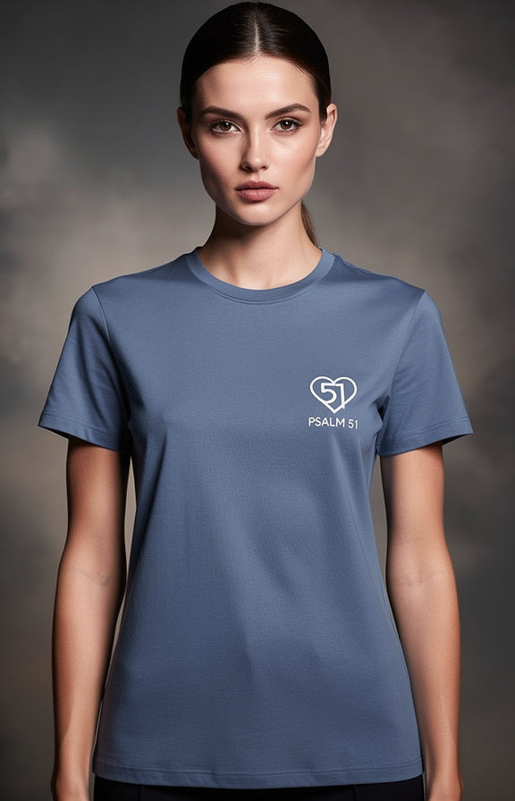 Person wearing a blue t-shirt with a logo and text on a gray background
