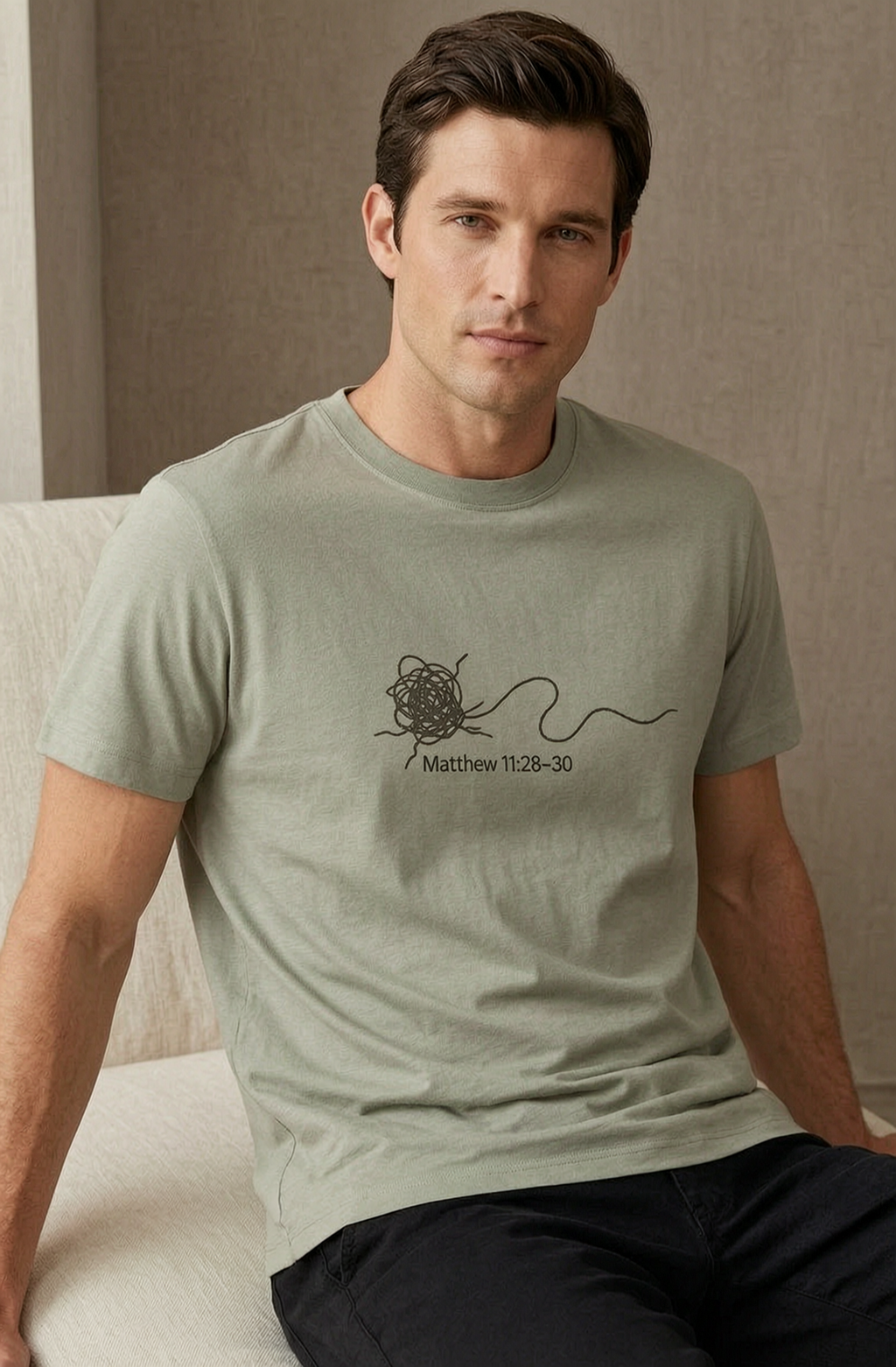 Male model wearing Rest Supima Tee in Meadow — editorial front view, Matthew 11:28 Rest gospel wordmark, 6oz SUPIMA® cotton premium faith-based tee by 4HG