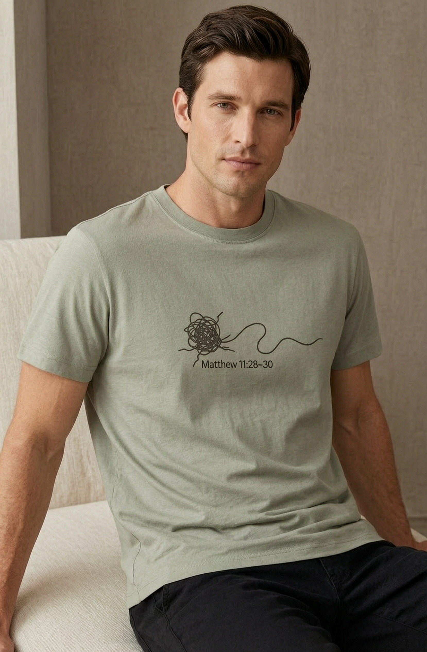 Male model wearing Rest Supima Tee in Meadow — editorial front view, Matthew 11:28 Rest gospel wordmark, 6oz SUPIMA® cotton premium faith-based tee by 4HG