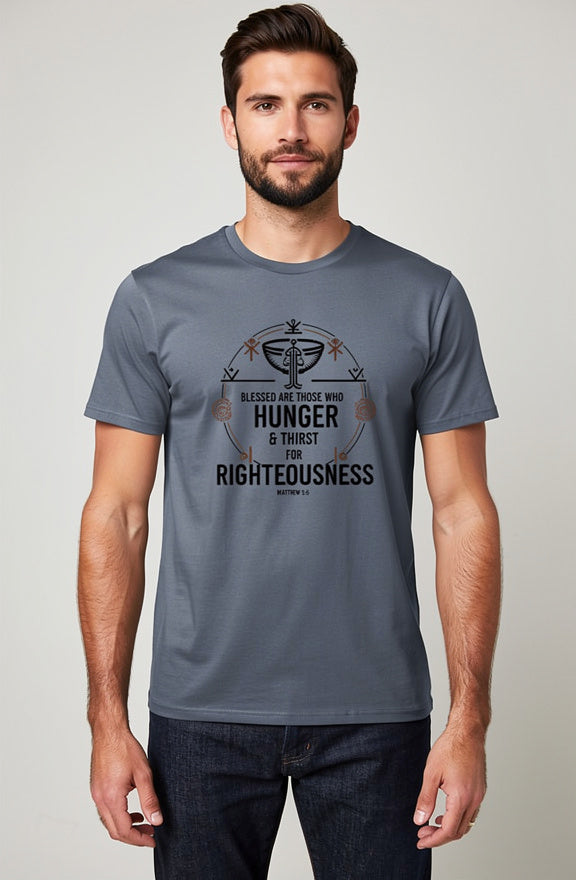 Man wearing a gray t-shirt with a graphic design and text on a plain background