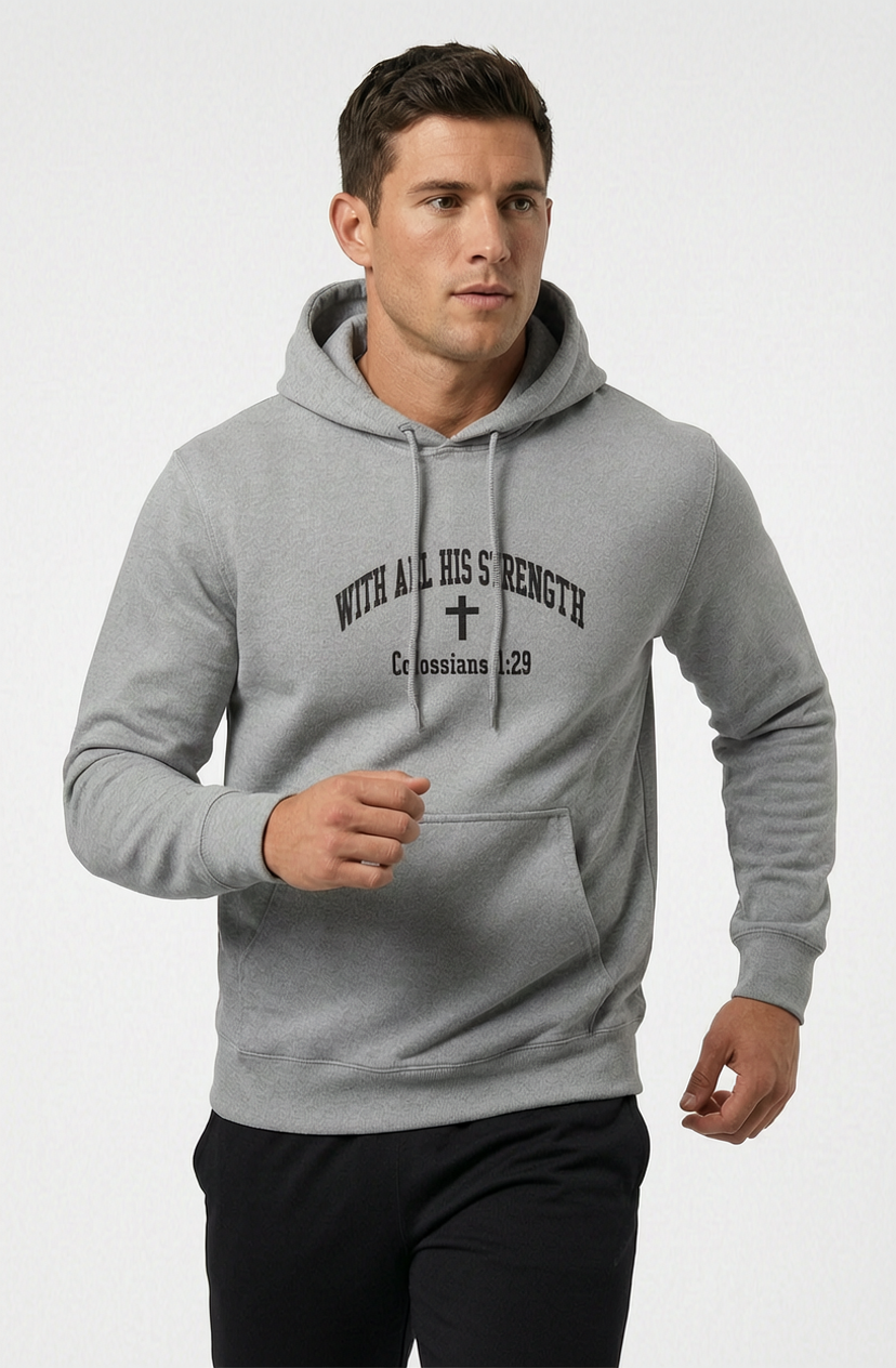Male model wearing With All His Strength Faith Pullover Hoodie in Athletic Heather — editorial style, Philippians 4:13 scripture design, Christian apparel by 4HG