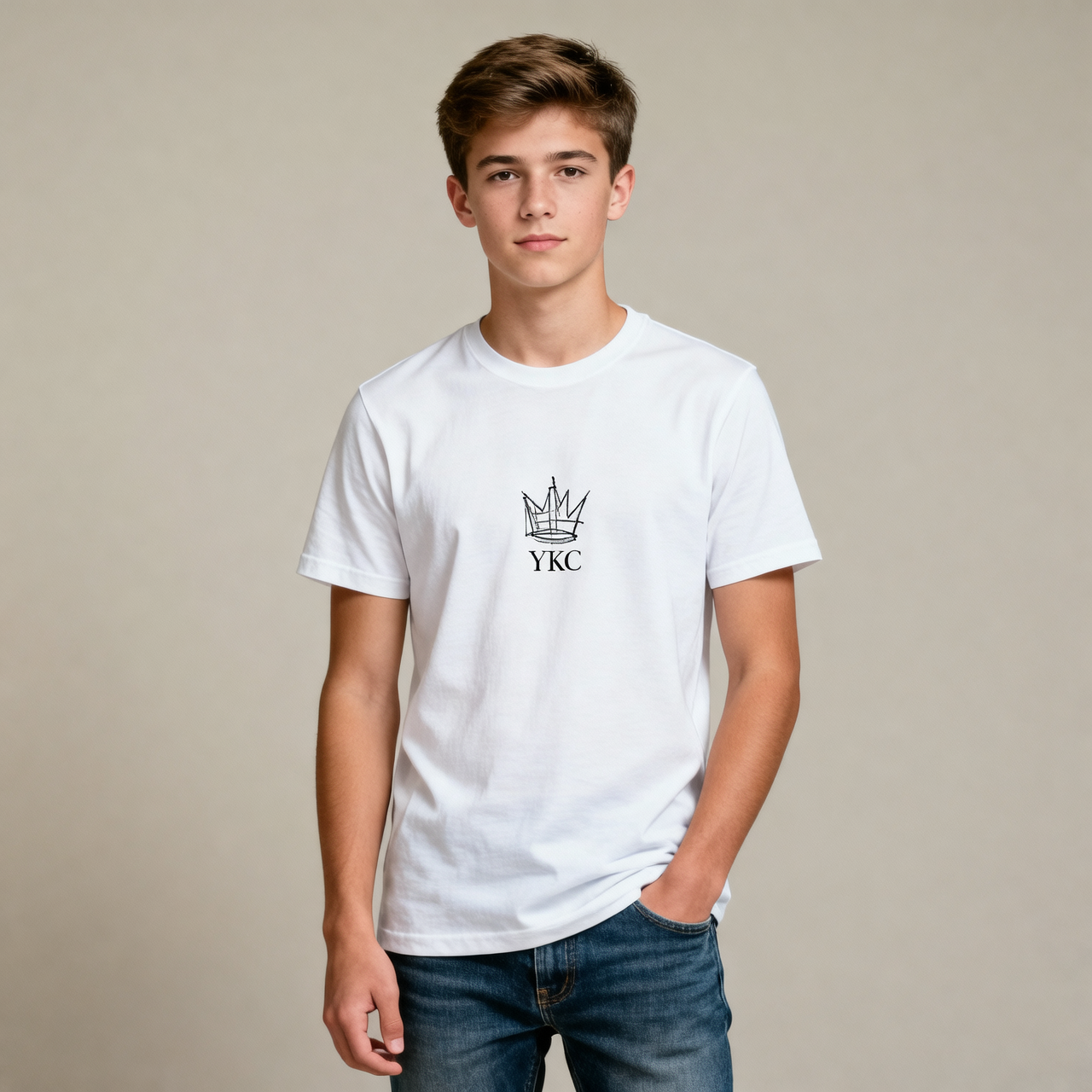 Person wearing a white t-shirt with a logo and text on a plain background